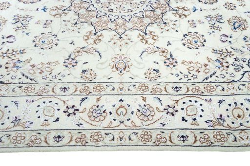 Corner detail of New Nain rug showing border pattern and Wool pile