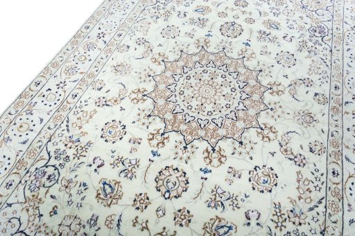 Backside of handmade New Nain rug showing knot structure and weave density