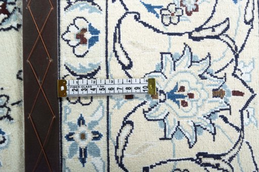Close-up detail of New Nain rug from Iran / Persia showing Wool weave