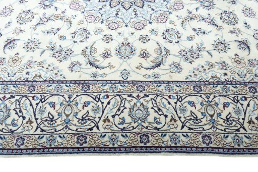 Corner detail of New Nain rug showing border pattern and Wool pile