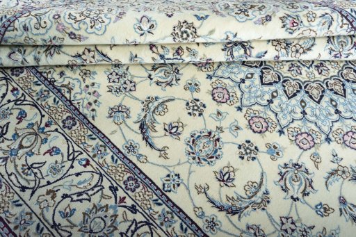 Close-up detail of New Nain rug from Iran / Persia showing Wool weave