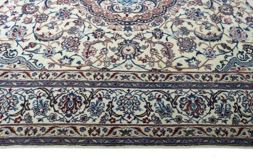 Corner detail of New Nain rug showing border pattern and Wool pile