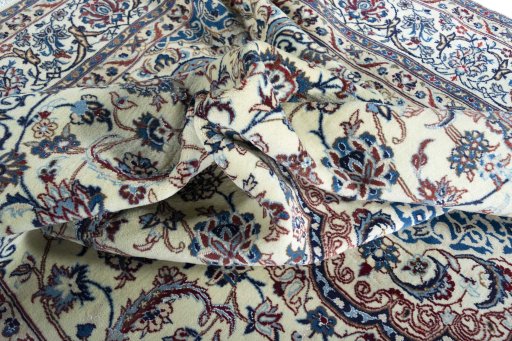 Surface texture of New Nain rug with natural Wool and intricate pattern