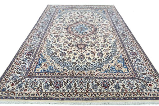 Surface texture of New Nain rug with natural Wool and intricate pattern