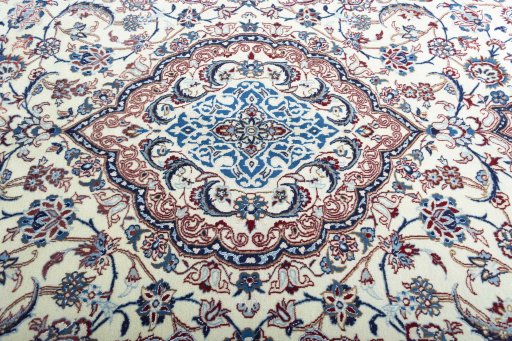 Central medallion detail of New Nain rug from Iran / Persia