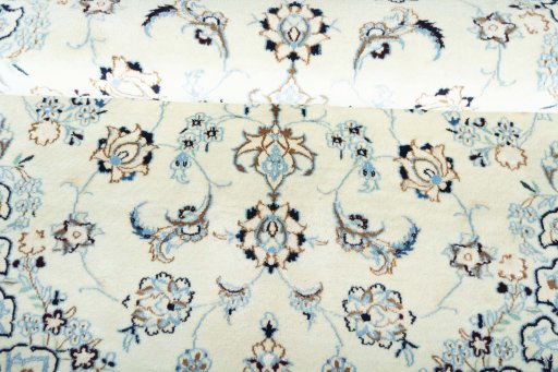 Close-up detail of New Nain rug from Iran / Persia showing Wool weave