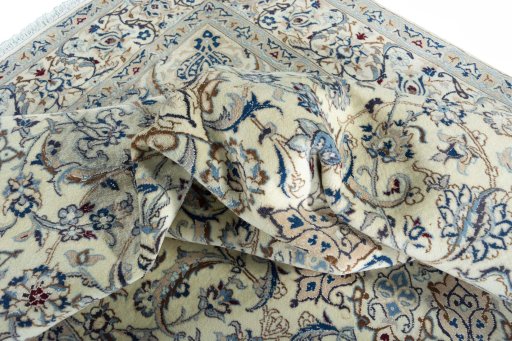 Surface texture of New Nain rug with natural Wool and intricate pattern