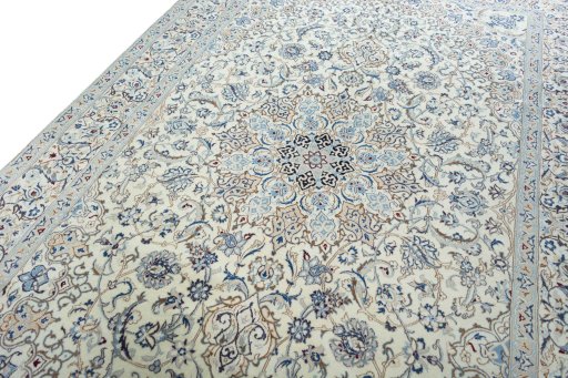 Backside of handmade New Nain rug showing knot structure and weave density