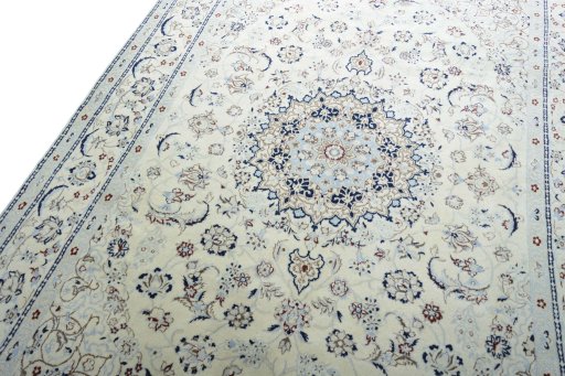 Backside of handmade New Nain rug showing knot structure and weave density