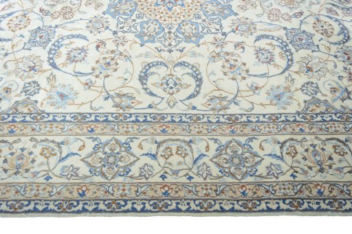 Corner detail of New Nain rug showing border pattern and Wool pile