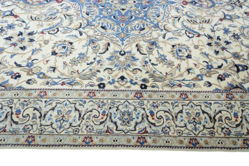 Corner detail of New Nain rug showing border pattern and Wool pile