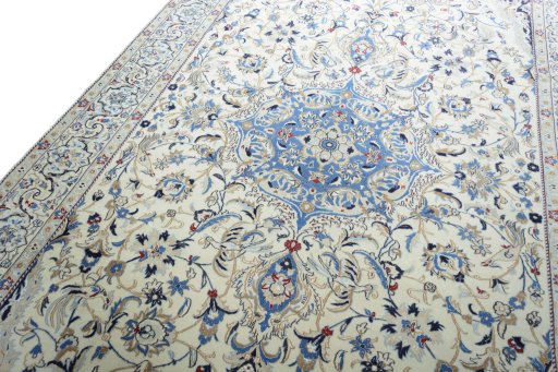 Backside of handmade New Nain rug showing knot structure and weave density