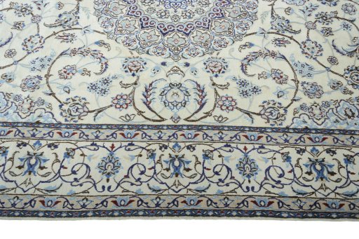 Corner detail of New Nain rug showing border pattern and Wool pile