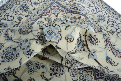 Surface texture of New Nain rug with natural Wool and intricate pattern