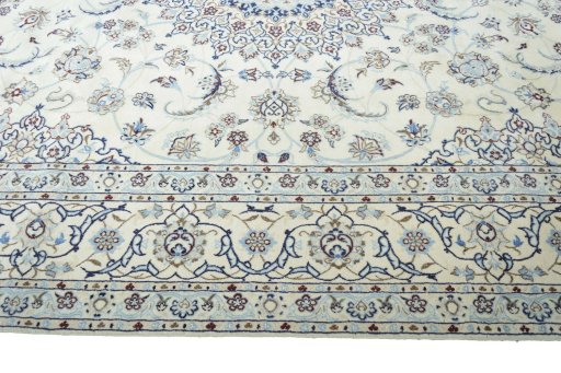 Corner detail of New Nain rug showing border pattern and Wool pile