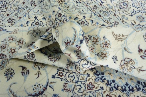 Surface texture of New Nain rug with natural Wool and intricate pattern