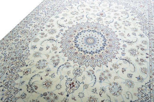 Backside of handmade New Nain rug showing knot structure and weave density
