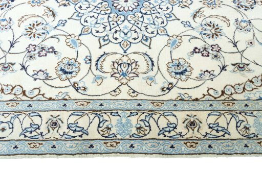 Corner detail of New Nain rug showing border pattern and Wool pile