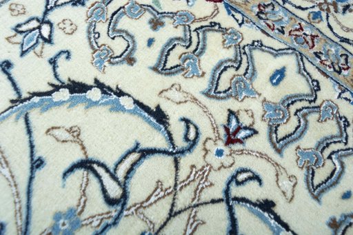 Corner detail of New Nain rug showing border pattern and Cork pile