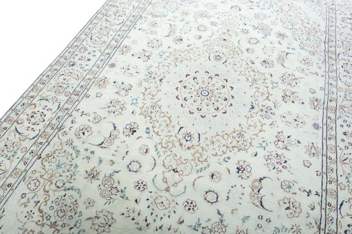 Backside of handmade New Nain rug showing knot structure and weave density