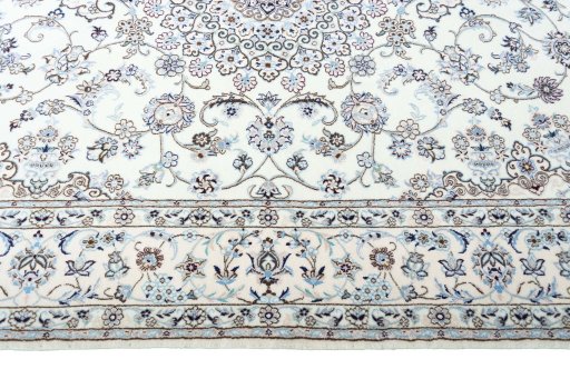 Corner detail of New Nain rug showing border pattern and Cork pile