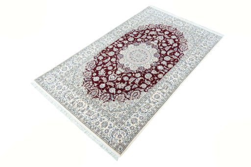 Corner detail of New Nain rug showing border pattern and Cork pile
