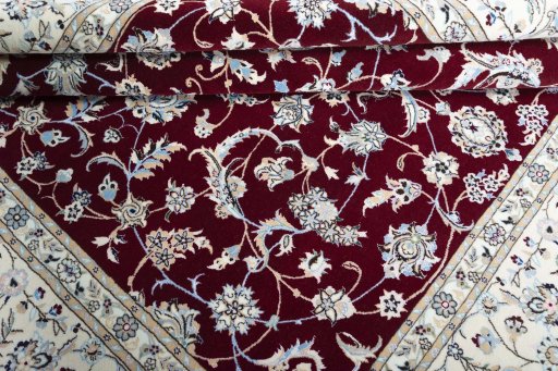 Corner detail of New Nain rug showing border pattern and Cork pile