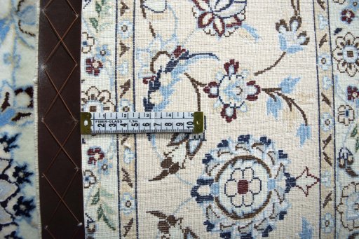 Surface texture of New Nain rug with natural Cork and intricate pattern