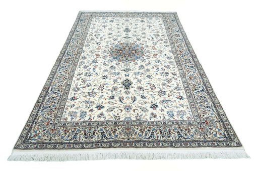 Surface texture of 2000s Nain rug with natural Cork and intricate pattern
