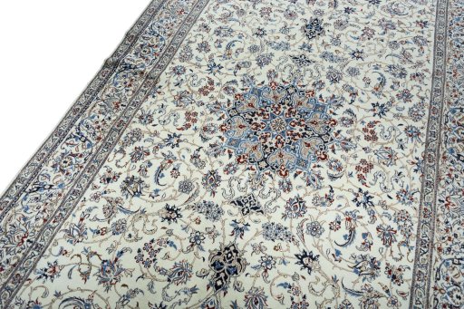 Backside of handmade 2000s Nain rug showing knot structure and weave density