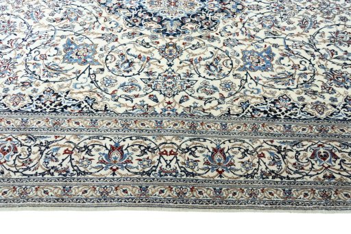 Corner detail of 2000s Nain rug showing border pattern and Cork pile