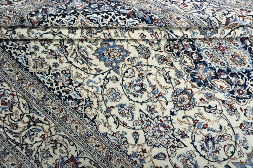 Close-up detail of 2000s Nain rug from Iran / Persia showing Cork weave