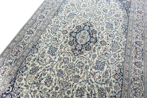 Backside of handmade 2000s Nain rug showing knot structure and weave density