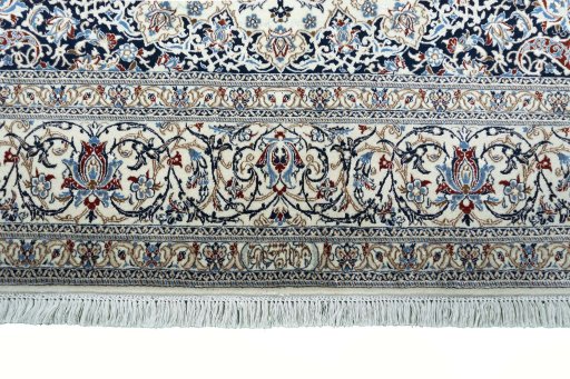 Full view of 2000s Nain rug from Iran / Persia, 300 × 171 cm in Beige tones