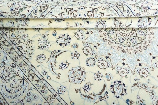 Close-up detail of New Nain rug from Iran / Persia showing Wool weave