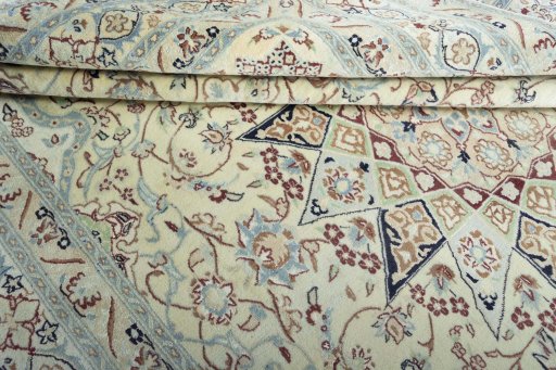 Close-up detail of 2000s Nain rug from Iran / Persia showing Wool weave
