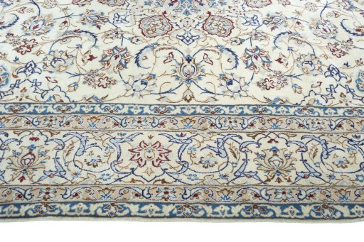 Corner detail of New Nain rug showing border pattern and Silk pile