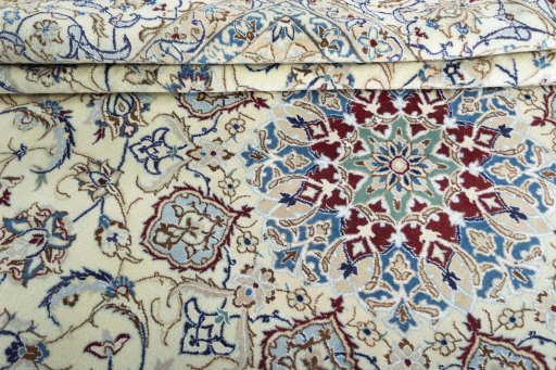 Close-up detail of New Nain rug from Iran / Persia showing Silk weave