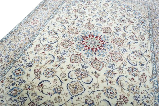 Backside of handmade New Nain rug showing knot structure and weave density