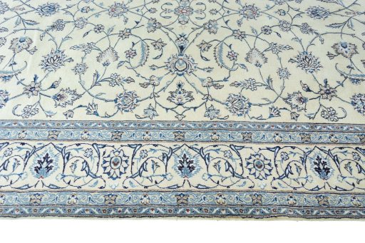 Corner detail of New Nain rug showing border pattern and Wool pile
