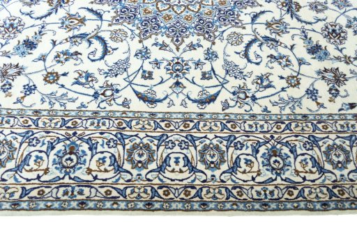 Corner detail of New Nain rug showing border pattern and Wool pile