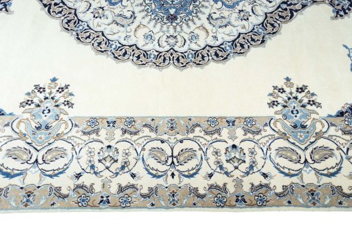 Corner detail of New Nain rug showing border pattern and Wool pile