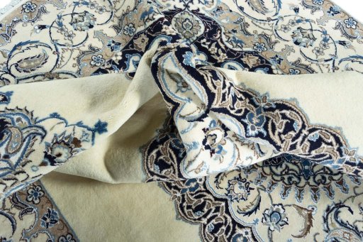 Surface texture of New Nain rug with natural Wool and intricate pattern