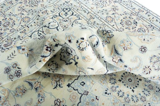 Surface texture of New Nain rug with natural Wool and intricate pattern