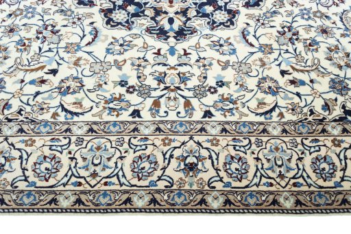 Corner detail of New Nain rug showing border pattern and Wool pile