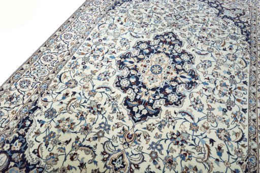 Backside of handmade New Nain rug showing knot structure and weave density