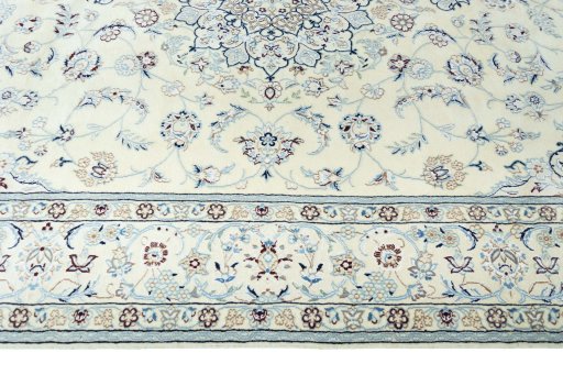 Corner detail of New Nain rug showing border pattern and Wool pile