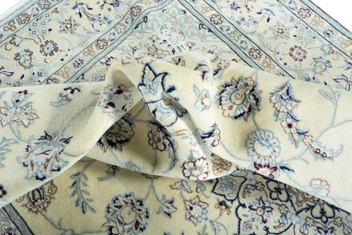 Surface texture of New Nain rug with natural Wool and intricate pattern