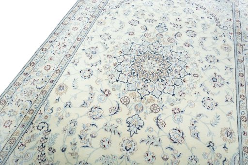 Backside of handmade New Nain rug showing knot structure and weave density