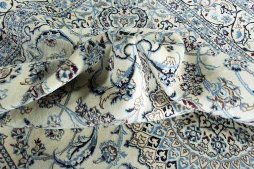 Surface texture of New Nain rug with natural Wool and intricate pattern